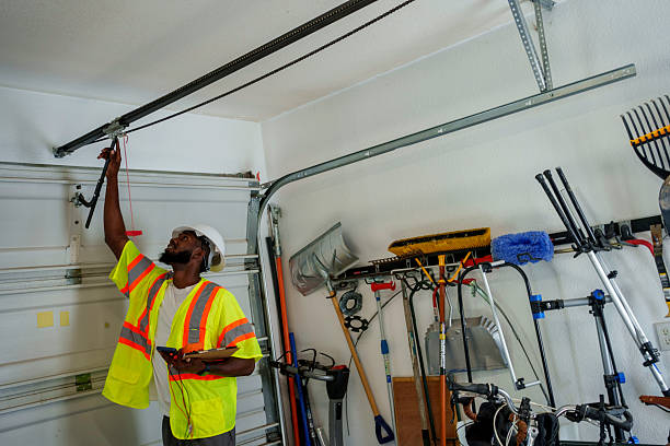 Professional Garage Door Panel Replacement technician working in New Town, ND